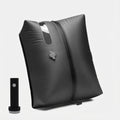 Soft-shell carry-on with spinner wheels in travel setting