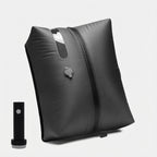 Soft-shell carry-on with spinner wheels in travel setting