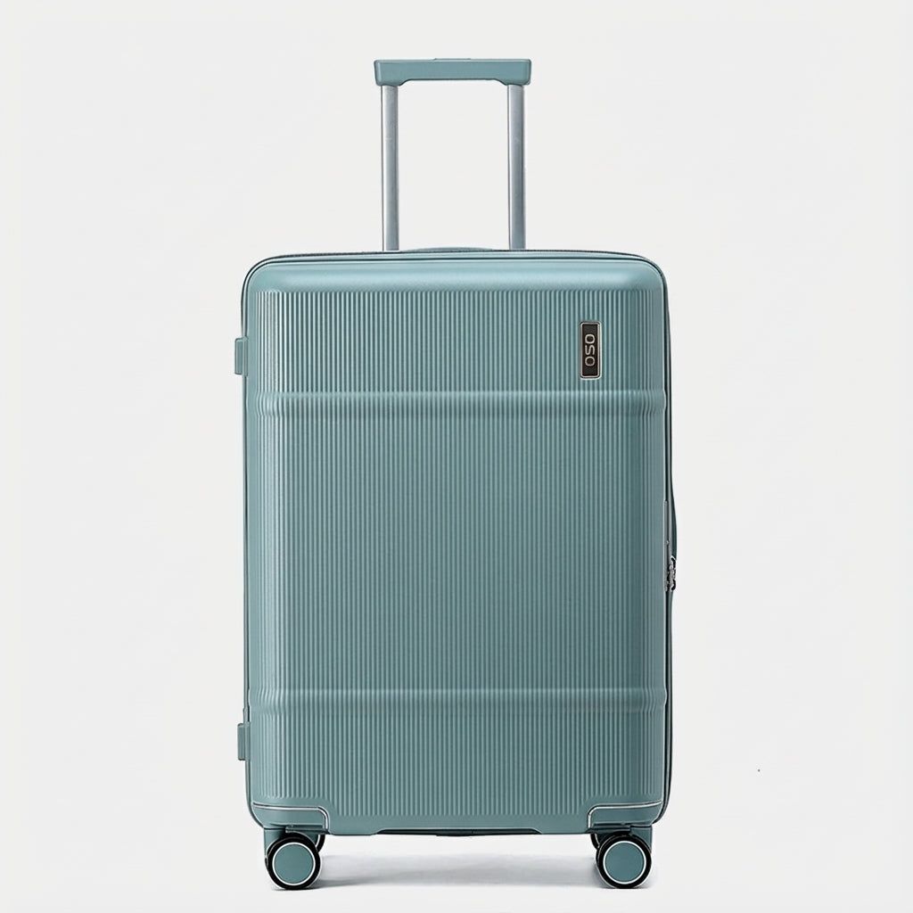 Close-up of textured polycarbonate shell and whisper-quiet spinner wheels