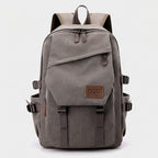 Ergonomic shoulder straps and premium canvas texture detail