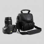 OSO Camera Handbag being carried with adjustable strap
