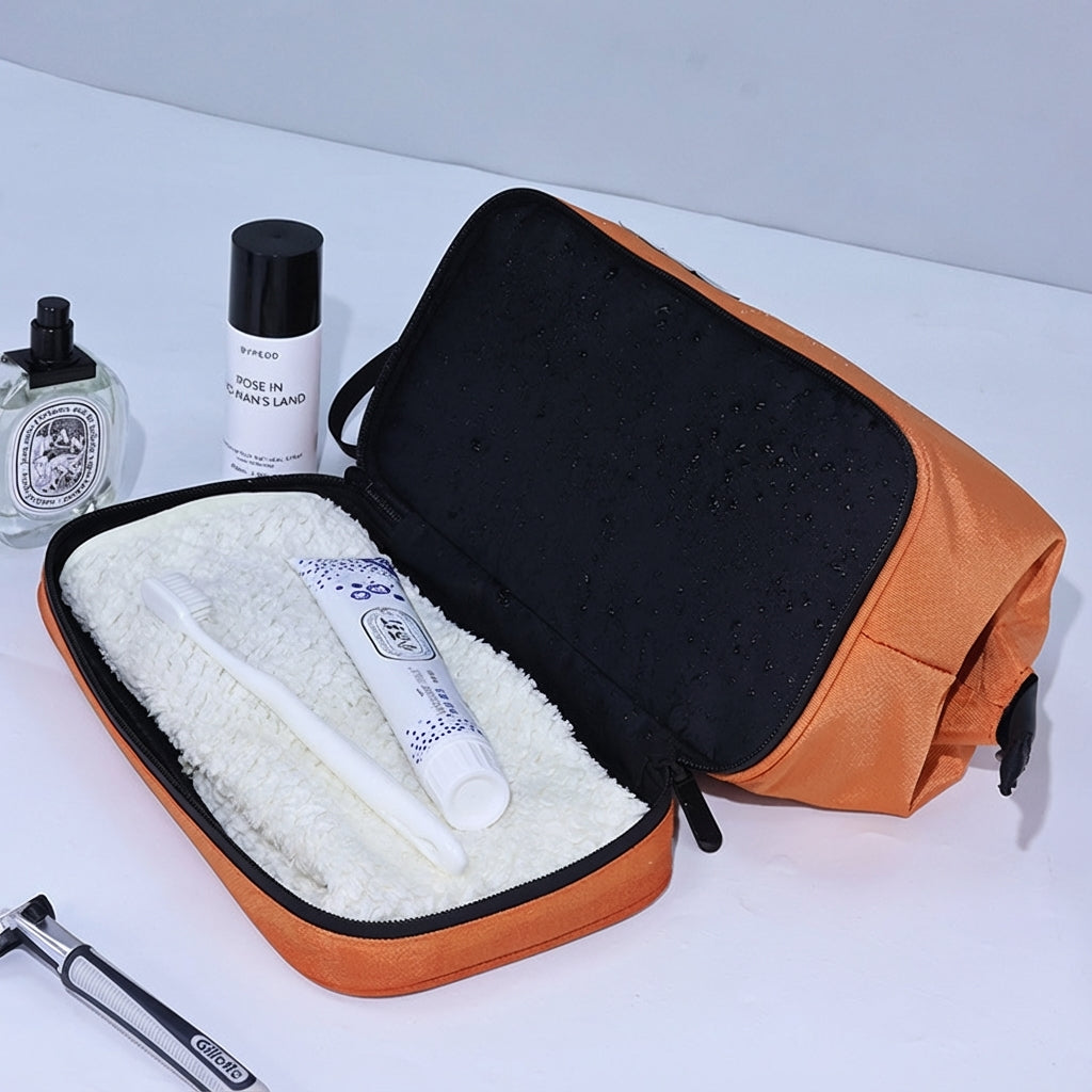 Interior view of OSO Dual Wash Bag with elastic loops and mesh pockets