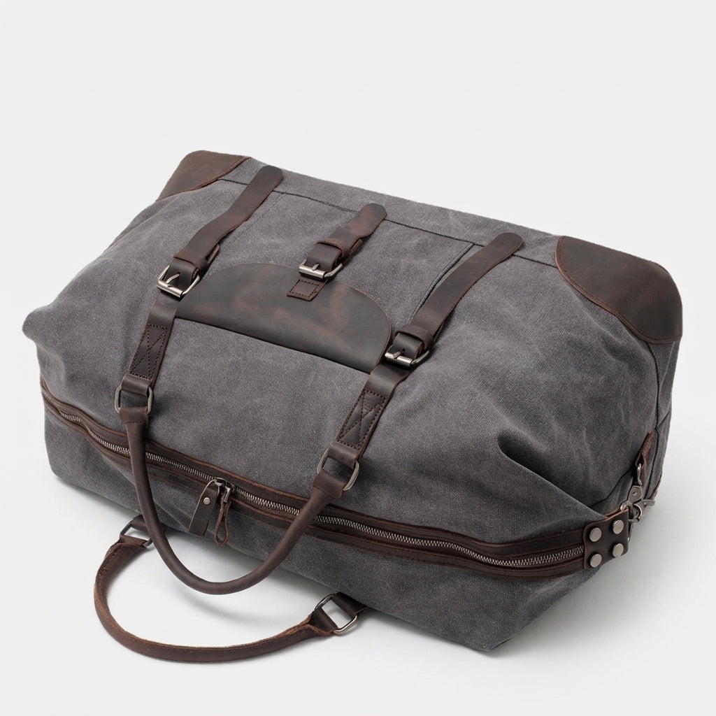 Carry-on sized duffle bag in slate grey with minimalist design