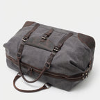 Carry-on sized duffle bag in slate grey with minimalist design