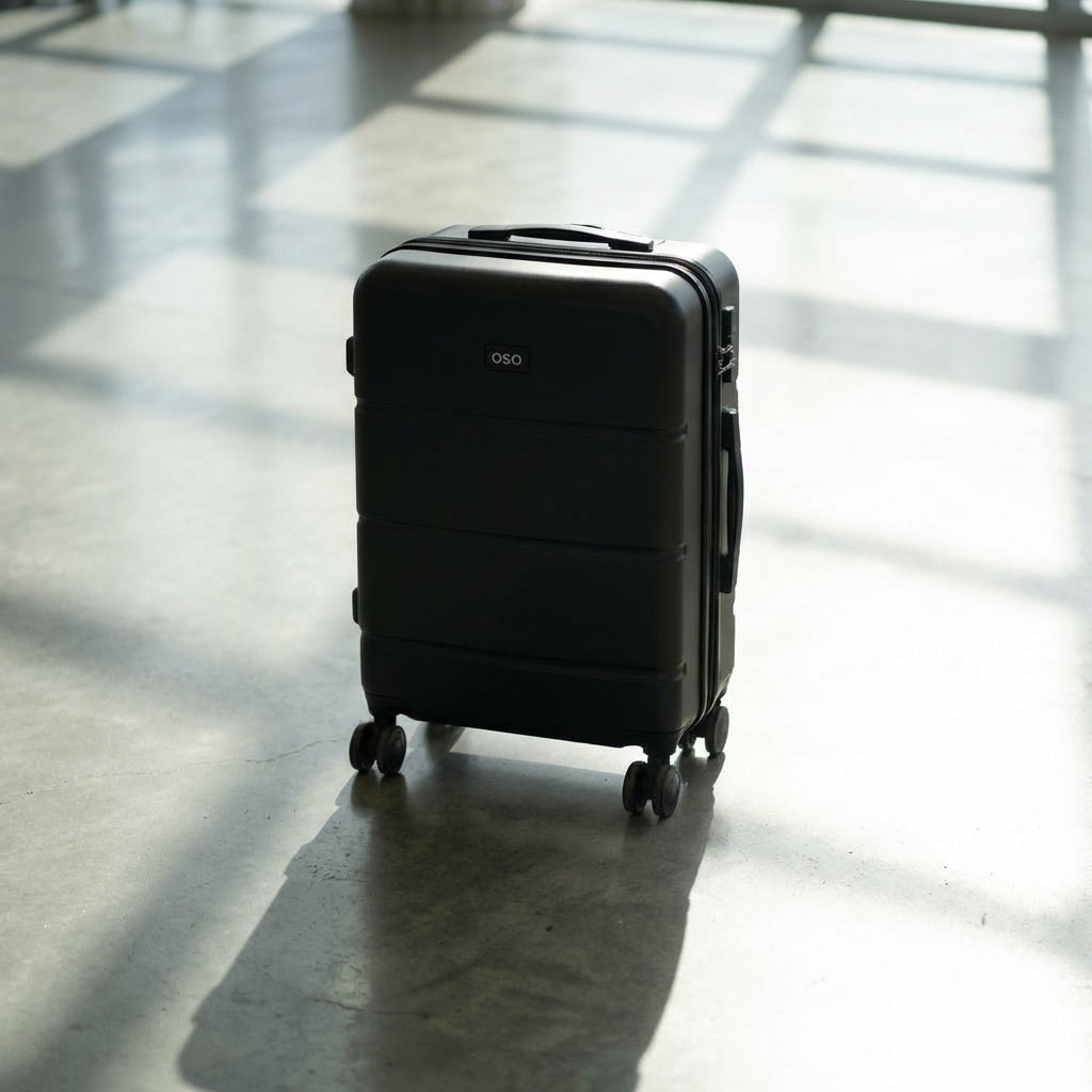 Front-access compartment open on hybrid carry-on showing laptop space