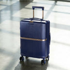 Graduate Bundle components: carry-on, tech case, and luggage tag arranged