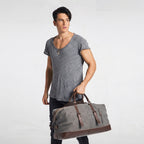 Interior view showing organized compartments of canvas duffle