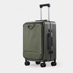 Soft-shell carry-on with spinner wheels in travel setting