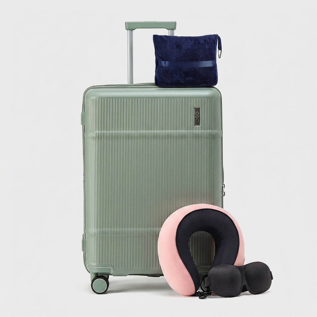 Deep-shell check-in trunk in minimalist color option with spinner wheels visible