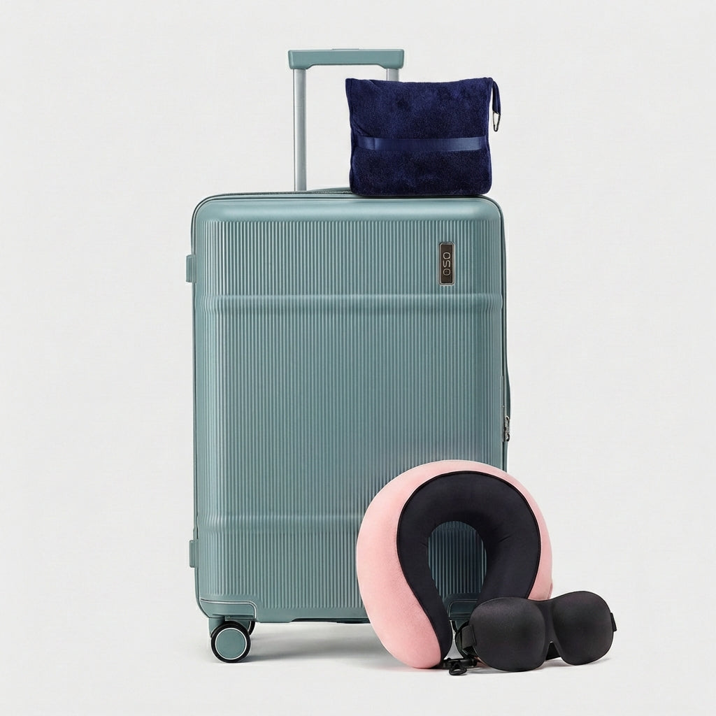 OSO Comfort Class Kit with 24-inch trunk and travel accessories arranged on neutral surface