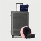 Deep-shell check-in trunk in minimalist color option with spinner wheels visible