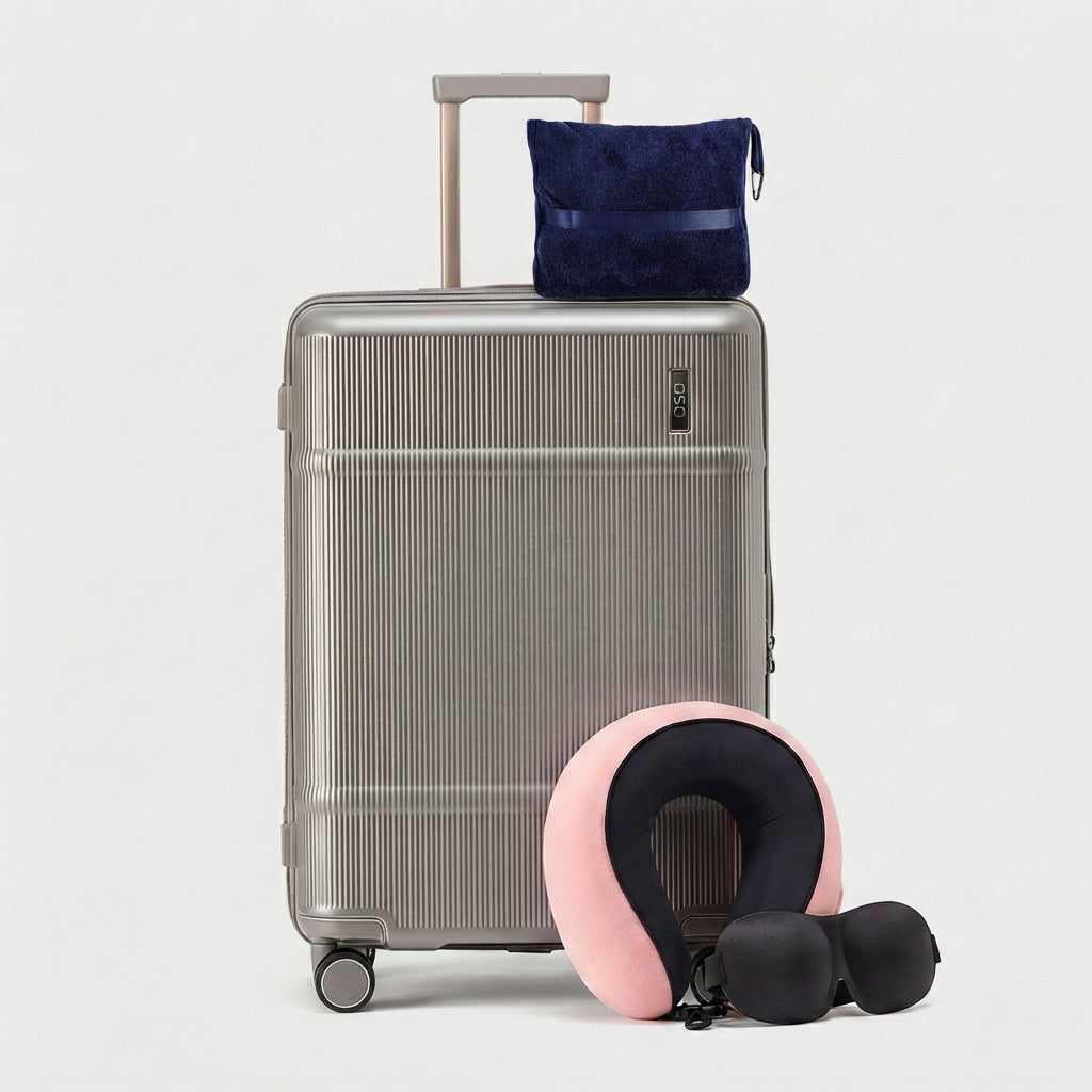 OSO Comfort Class Kit with 24-inch trunk and travel accessories arranged on neutral surface