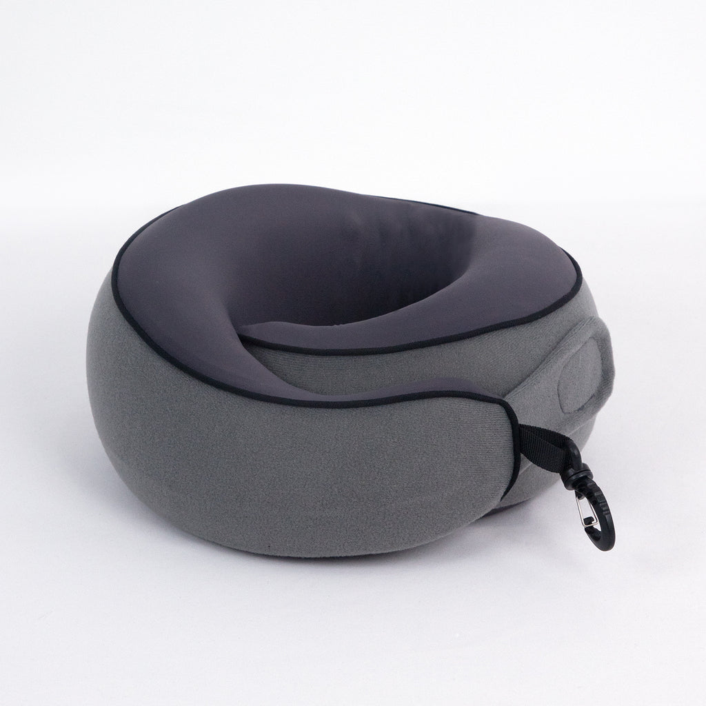 Memory foam travel pillow from OSO Comfort Flight Set showing ergonomic neck support design