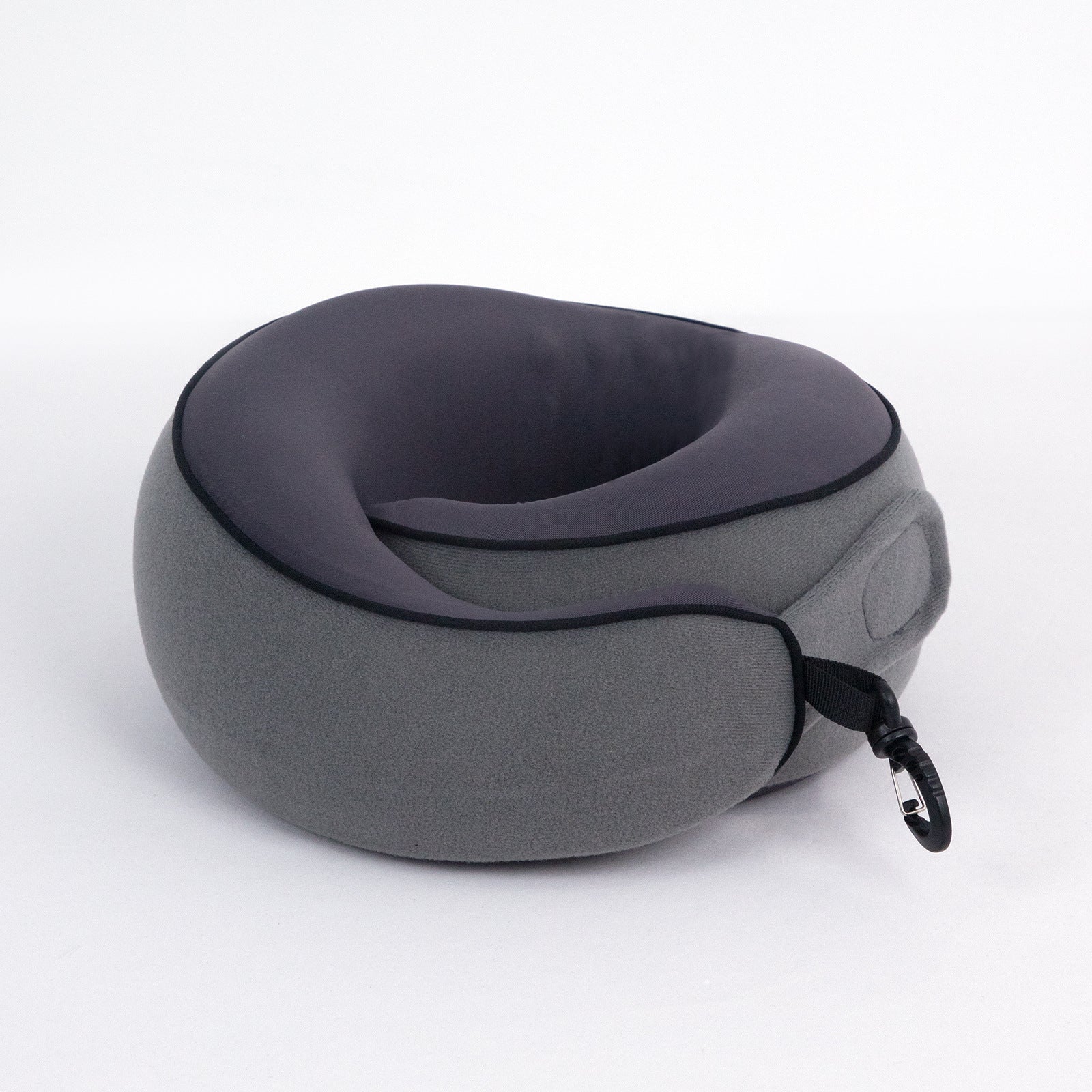 Memory foam travel pillow from OSO Comfort Flight Set showing ergonomic neck support design